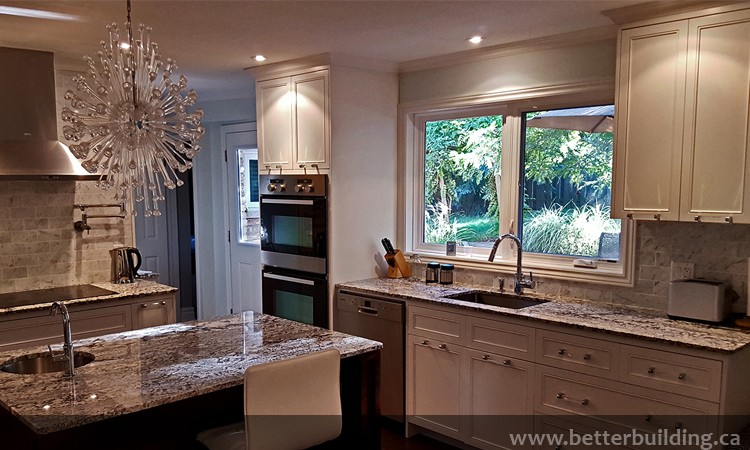 Custom Kitchen with Walnut Island and Seating Area