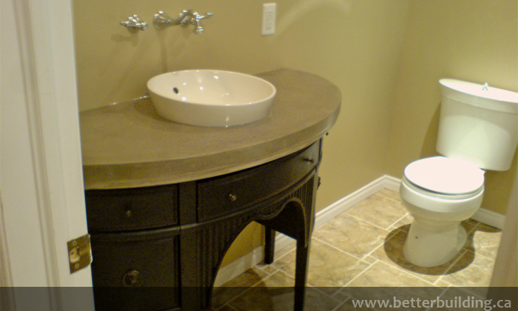 Furniture modfied into a vanity with concrete countertop